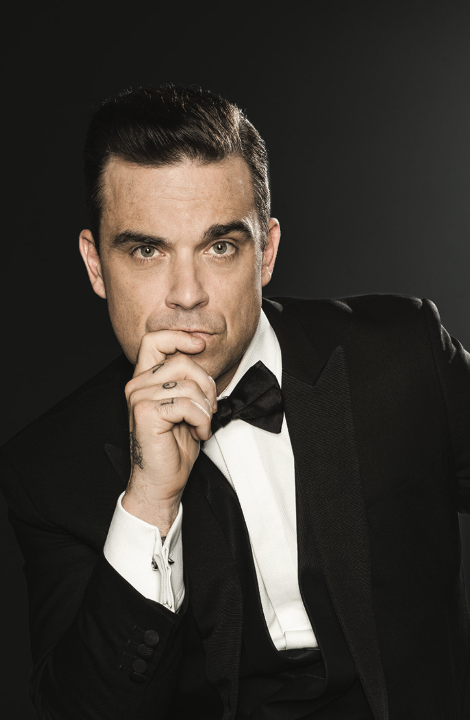 Знаменитый мужчина певец. Робби. Robbie Williams. Английский певец Робби Уильямс. Робби Уильямс певец фото.